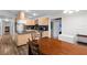 Bright kitchen and dining area boasting plenty of counter space, modern appliances, and natural light at 8001 N Ola Ave, Tampa, FL 33604