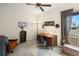 Bedroom with a desk, chair, and natural light at 8308 Mobile Cir, Weeki Wachee, FL 34613