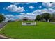 Spacious community clubhouse set on a lush lawn, providing a central gathering place for residents at 8308 Mobile Cir, Weeki Wachee, FL 34613