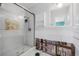 Renovation-ready bathroom with glass enclosed shower and open plumbing at 8722 Thornwood Ln, Tampa, FL 33615