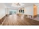 Large living room with tile flooring and an open floor plan at 8722 Thornwood Ln, Tampa, FL 33615