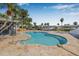 Inviting backyard pool with poolside hot tub and access to waterfront with boats and a canal at 8722 Thornwood Ln, Tampa, FL 33615