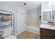 Well-lit bathroom with stylish finishes and tile accents at 903 Tomahawk Trl, Brandon, FL 33511
