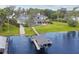 Expansive home featuring lake access with a private dock and beautiful outdoor space at 919 Ballinger Rd, Lutz, FL 33548