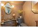 A stylish half-bathroom with ornate finishes, offering a blend of vintage charm and modern convenience at 919 Ballinger Rd, Lutz, FL 33548