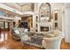 Elegant living room with a fireplace, soaring ceilings, and sophisticated decor creating an inviting atmosphere at 919 Ballinger Rd, Lutz, FL 33548