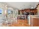 Expansive living space with beautiful lake views, custom built-ins, adjacent breakfast nook and hardwood floors at 919 Ballinger Rd, Lutz, FL 33548