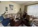 This living room is in need of repair; dispose of all items and remodel to your taste! at 9606 N Newport Ave, Tampa, FL 33612