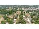 Aerial view of the neighborhood, with the property indicated by a yellow arrow at 1010 Oakhill St, Seffner, FL 33584