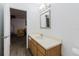 Clean bathroom featuring a vanity with a sink and a view into the next room at 1010 Oakhill St, Seffner, FL 33584