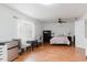 This bedroom is spacious and bright with a ceiling fan and comfortable furnishings at 1010 Oakhill St, Seffner, FL 33584