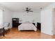 This bedroom is spacious and bright with a ceiling fan and comfortable furnishings at 1010 Oakhill St, Seffner, FL 33584