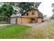 Charming two-story home with a two-car garage and a well-maintained lawn at 1010 Oakhill St, Seffner, FL 33584