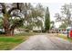 Street view of property featuring a long driveway at 1010 Oakhill St, Seffner, FL 33584