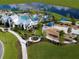 Gorgeous aerial view of community with pool, clubhouse, and play area at 10153 Spruce River Way, Parrish, FL 34219