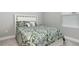 Comfortable bedroom with a comfortable bed, decorative throw pillows and window at 10153 Spruce River Way, Parrish, FL 34219