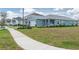 Charming home with a well-manicured lawn and inviting curb appeal at 10153 Spruce River Way, Parrish, FL 34219