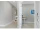 Bright office featuring a light interior, tiled floors leading to carpet, and a small table at 10153 Spruce River Way, Parrish, FL 34219