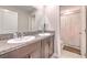 Bathroom featuring a double sink vanity and separate toilet at 10210 White Linen Ave, Riverview, FL 33578