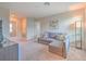 Cozy bedroom with a comfortable seating area and neutral decor at 10210 White Linen Ave, Riverview, FL 33578