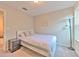 Bedroom featuring carpeted floors, neutral walls, and lamp at 10210 White Linen Ave, Riverview, FL 33578