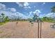 Community playground with slides, swings, and various playing structures with a wood chip ground cover at 10210 White Linen Ave, Riverview, FL 33578