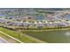 Stunning aerial perspective featuring picturesque ponds, lush landscapes, and well-planned community at 10732 Chippewa Dr, Parrish, FL 34219