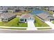 The house from an aerial view in a residential community positioned on a pond at 10732 Chippewa Dr, Parrish, FL 34219