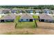 Aerial view of a home with an ample fenced backyard in a lovely, planned community at 10732 Chippewa Dr, Parrish, FL 34219