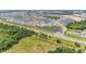 Beautiful aerial view of a Primary-planned community with lakes and lush landscaping at 10732 Chippewa Dr, Parrish, FL 34219