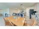 Dining area opens to the kitchen with bar seating, ideal for casual meals and entertaining at 10732 Chippewa Dr, Parrish, FL 34219