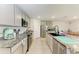 Well-equipped kitchen with stainless steel appliances and stylish granite countertops at 10732 Chippewa Dr, Parrish, FL 34219