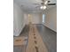 Bright, airy living room featuring luxury vinyl plank flooring, neutral paint, and abundant natural light at 1107 Howard St, Clearwater, FL 33756