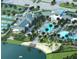 Community clubhouse featuring a large pool, tennis courts, beach and various recreational facilities at 11737 Myakka Blue Dr, Venice, FL 34293