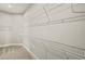 Walk in closet features multiple wire racks for storage at 11737 Myakka Blue Dr, Venice, FL 34293