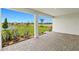 Charming paver patio with scenic backyard views offers peaceful relaxation and outdoor space at 11737 Myakka Blue Dr, Venice, FL 34293