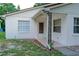 Cozy single-story home with a textured stucco exterior and decorative support post at 1262 Jeffords St, Clearwater, FL 33756