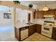 Kitchen with a breakfast bar that opens up to the living room at 1262 Jeffords St, Clearwater, FL 33756