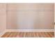 Walk-in closet featuring built-in wire shelving and durable wood floors at 12626 Glenn Creek Dr, Riverview, FL 33569