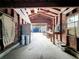 Interior view of the garage with old workbench and debris at 1267 Woodlawn Ter, Clearwater, FL 33755