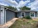 Inviting front entrance with stylish door and well-maintained landscaping at 12912 Leadwood Dr, Riverview, FL 33579