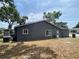 Charming home featuring a well-maintained exterior with a spacious backyard at 12912 Leadwood Dr, Riverview, FL 33579