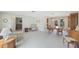 Spacious living room with dining area and plush seating arrangements, offering a comfortable living space at 13563 Cordova Dr, Largo, FL 33774