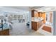 Living spaces with connecting rooms, lots of light, open concept, and comfortable seating at 13563 Cordova Dr, Largo, FL 33774