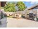 Outdoor patio with chairs and grill, great for entertaining and relaxing at 14000 104Th Ave, Largo, FL 33774