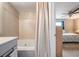 Bright bathroom with tub, shower, and a vanity, offering comfort and style at 14000 104Th Ave, Largo, FL 33774