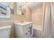 Bathroom features tiled tub/shower combo and a white sink vanity at 14000 104Th Ave, Largo, FL 33774