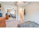 Bedroom with view into closet through mirrored doors at 14000 104Th Ave, Largo, FL 33774