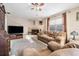 Comfortable living room featuring a fireplace and neutral decor at 14000 104Th Ave, Largo, FL 33774