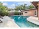 Refreshing pool with surrounding patio, ideal for outdoor living and entertaining at 14000 104Th Ave, Largo, FL 33774